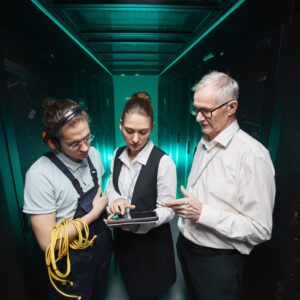 people-working-in-server-room-2023-11-27-05-19-24-utc-min-scaled.jpg